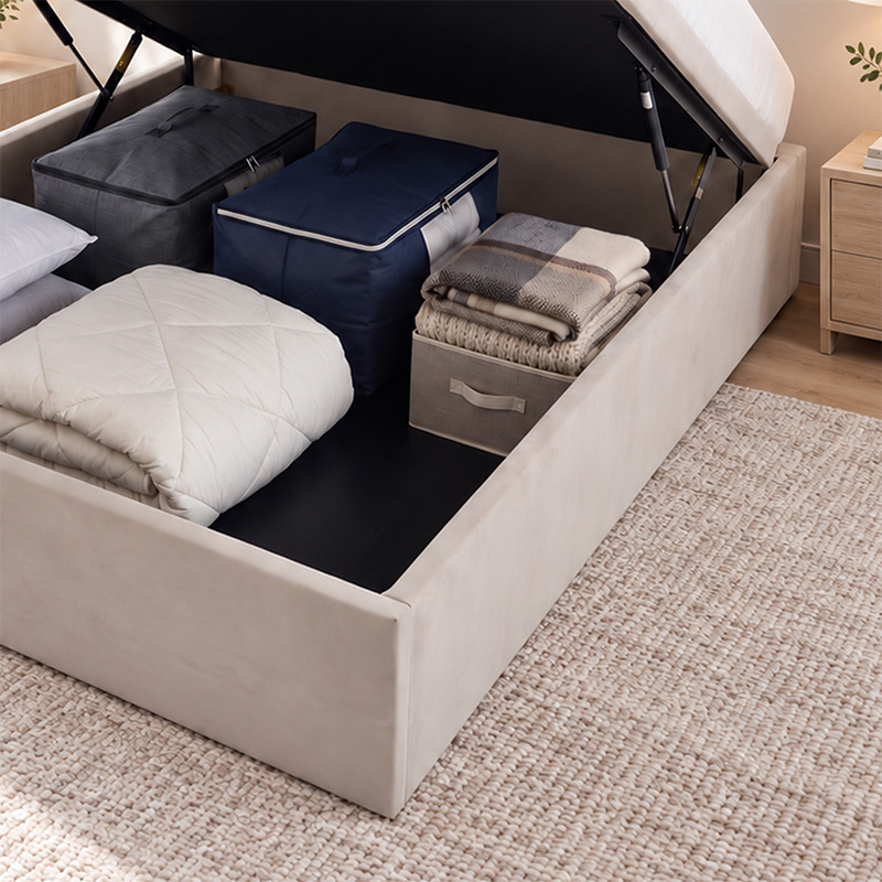 lucy-lucy-storage-bedframe-under-bed-storage-close-up Lucy storage base packed with boxes and bedding