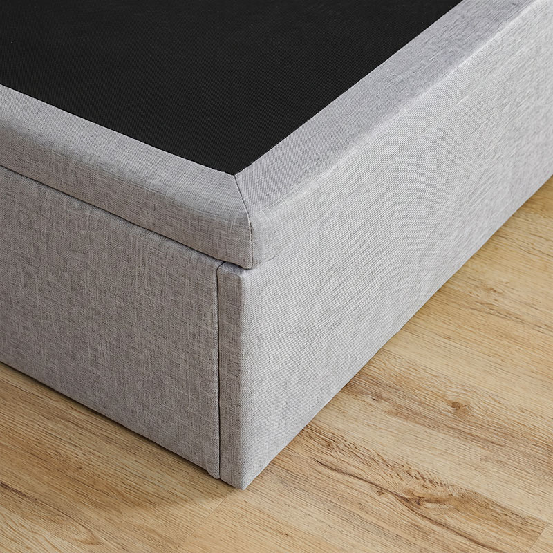 mica-mica-fabric-storage-bed-rounded-corners-fabric-upholstery Rounded fabric-covered corner of the Mica base